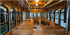 Interior view of Green & Tan Trolley – 32
Passengers