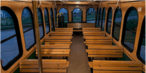 Wooden bench seating inside a trolley